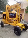 CONCRETE MIXER WITH LIFT